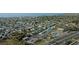 A panoramic aerial perspective shows properties within the community near a waterway and highway for convenience at 13800 Judy Ave, Hudson, FL 34667