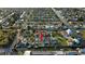 Expansive aerial view of a residential waterfront community with canals and boat access to the water at 13800 Judy Ave, Hudson, FL 34667