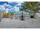 Expansive backyard area with an outdoor grill and patio setup, perfect for entertaining at 13800 Judy Ave, Hudson, FL 34667