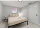 Cozy bedroom featuring neutral tones, offering a serene and relaxing space at 13800 Judy Ave, Hudson, FL 34667
