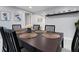 Formal dining room featuring modern decor with a decorative flower centerpiece at 13800 Judy Ave, Hudson, FL 34667
