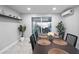 Modern dining room with patio access, perfect for indoor-outdoor living at 13800 Judy Ave, Hudson, FL 34667