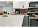 Kitchen with quartz countertops, stainless steel appliances, and modern backsplash at 13800 Judy Ave, Hudson, FL 34667
