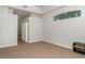 Spacious primary bedroom with ceiling fan and views of the backyard at 14266 Creek Run Dr, Riverview, FL 33579
