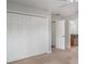 Bright bedroom features a ceiling fan, closet, and an ensuite bathroom for added convenience at 14266 Creek Run Dr, Riverview, FL 33579