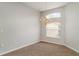 Dining room with chandelier, large window, and neutral paint at 14266 Creek Run Dr, Riverview, FL 33579