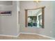Living room featuring tile floors, a bay window, and neutral-painted walls at 14266 Creek Run Dr, Riverview, FL 33579