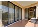 Spacious balcony with sliding glass doors, offering serene outdoor living and natural light at 1531 Ember Ln, Tarpon Springs, FL 34689