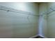 Empty walk-in closet with wire shelving ready for organization at 1531 Ember Ln, Tarpon Springs, FL 34689