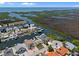 Waterfront homes along canals offer boat access to open water and stunning coastal views at 15713 Century Dr, Hudson, FL 34667