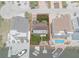 Aerial view showcases the property's boundaries, backyard, and waterfront access with boat docks at 15713 Century Dr, Hudson, FL 34667