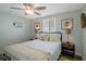 Lovely bedroom with comfortable full bed, and windows providing natural light at 15713 Century Dr, Hudson, FL 34667