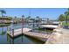 Beautiful waterfront property featuring a private dock, perfect for boating and enjoying the scenic views at 15713 Century Dr, Hudson, FL 34667