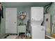Functional laundry area with a washing machine and sink providing convenience at 15713 Century Dr, Hudson, FL 34667
