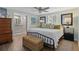 Light and airy main bedroom featuring coastal-style decor and a large closet at 15713 Century Dr, Hudson, FL 34667