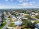 A lovely aerial view of a charming neighborhood with tree-lined streets on a sunny day at 1701 62Nd S Ter, St Petersburg, FL 33712