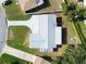 Aerial view of the roof with a driveway leading up to a neatly maintained single-Gathering home at 1701 62Nd S Ter, St Petersburg, FL 33712
