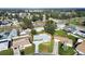The aerial view showcases a well-placed home with a long driveway in a residential neighborhood at 1701 62Nd S Ter, St Petersburg, FL 33712