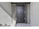 Close-up view of the front door with glass sidelights and stylish tile flooring at 1701 62Nd S Ter, St Petersburg, FL 33712