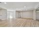 Open living room featuring new flooring and plenty of natural light at 1701 62Nd S Ter, St Petersburg, FL 33712