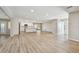 Open living space with new flooring and modern design, seamlessly integrates indoor and outdoor areas at 1701 62Nd S Ter, St Petersburg, FL 33712