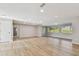 Spacious living area with new flooring and an abundance of natural light at 1701 62Nd S Ter, St Petersburg, FL 33712