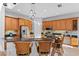 Spacious kitchen with oak cabinets, stainless steel appliances, and granite counter tops at 18050 Cozumel Isle Dr, Tampa, FL 33647