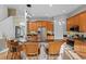 Kitchen with granite countertops, stainless steel appliances, and breakfast bar seating at 18050 Cozumel Isle Dr, Tampa, FL 33647