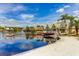 Lakefront property with a private dock and clubhouse, perfect for waterfront living at 18050 Cozumel Isle Dr, Tampa, FL 33647