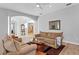 Spacious living room with archways, natural light, and elegant furnishings create a welcoming atmosphere at 18050 Cozumel Isle Dr, Tampa, FL 33647