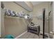 A walk-in closet for organizing clothes with racks and shelves at 19309 Garden Quilt Cir, Lutz, FL 33558