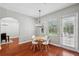 Cozy breakfast nook with a round table, lots of natural light, and a view of the yard at 2011 Water Wheel Ct, Dunedin, FL 34698