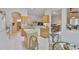 Open kitchen featuring ample cabinet space, tile flooring, and a breakfast nook at 2128 Worthington Greens Dr, Sun City Center, FL 33573