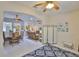 Open-concept floor plan showcasing a dining area, living room, and kitchen at 2128 Worthington Greens Dr, Sun City Center, FL 33573