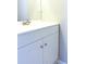 Bathroom with white cabinets, a large mirror, and modern fixtures creates a clean, functional space at 2302 Maki Rd # 69, Plant City, FL 33563