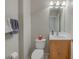 Cozy powder room with modern fixtures, a convenient layout, and neutral colors at 2424 Caraway Dr, Venice, FL 34292