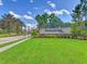 Welcoming entrance to Stoneybrook at Venice, showcasing lush landscaping and a well-maintained community sign at 2424 Caraway Dr, Venice, FL 34292