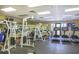 Well-equipped gym featuring Cybex weight machines and treadmills in a community fitness center at 2424 Caraway Dr, Venice, FL 34292