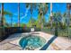 Private hot tub area with brick surroundings, offering a relaxing retreat for residents to unwind at 2424 Caraway Dr, Venice, FL 34292