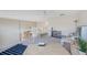 Spacious loft area with carpet, ceiling fan, and natural light, perfect for flexible living and entertaining at 2424 Caraway Dr, Venice, FL 34292