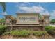 Stone entrance sign for Edgewater at Lake Brandon in a lush, landscaped setting at 2435 Edgewater Falls Dr, Brandon, FL 33511