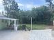 Spacious backyard with a patio, grilling area, and ample green space, perfect for outdoor activities at 2444 35Th N St, St Petersburg, FL 33713