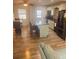 Bright kitchen with a center island, modern appliances, and wood-look floors with access to the backyard at 2444 35Th N St, St Petersburg, FL 33713