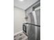 The modern kitchen features stainless steel appliances, gray cabinets, and clean lines at 24862 Us Highway 19 N # 1105, Clearwater, FL 33763