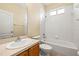 Clean bathroom featuring a tiled shower-tub combo and single vanity at 27353 Edenfield Dr, Wesley Chapel, FL 33544
