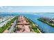 An aerial view of waterfront condos with boat slips near the water at 2741 Via Cipriani # 934B, Clearwater, FL 33764
