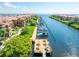 A waterfront community dock and a nearby row of condo units at 2741 Via Cipriani # 934B, Clearwater, FL 33764