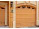 Attached spacious two car garage with carriage doors on a beautiful orange terracotta property at 2741 Via Cipriani # 934B, Clearwater, FL 33764