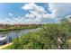 Breathtaking wide water view of the canal, docks, and waterfront neighborhood from the balcony at 2741 Via Cipriani # 934B, Clearwater, FL 33764