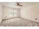 Bright bedroom with carpet and plantation shutters, providing a cozy and private retreat at 3058 Cara Ct, Palm Harbor, FL 34684